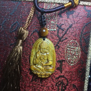 Phật bản mệnh a di đà mắt hổ vàng