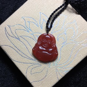 Phật di lặc đá mã não đỏ