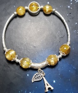 Vòng đá thạch anh tóc vàng mix charm bạc